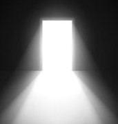 An open doorway leading into darkness