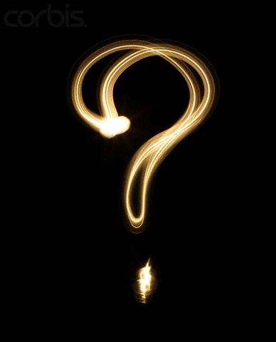 A question mark formed from light representing philosophical inquiry